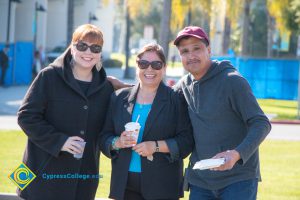 Christina Mix and Jose Siordia with a woman in sunglasses.