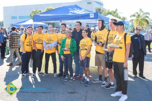 Group of Science, Engineering and Math students wearing yellow shirts.