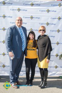 Gil Contreras, Dr. Schilling and young lady wearing a Science, Engineering and Math shirt and black pants.