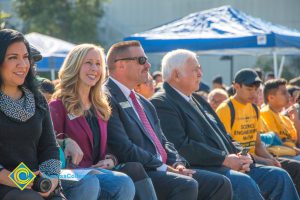 Group of people sitting at the SEM Groundbreaking event.