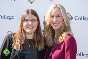 Two women smiling.