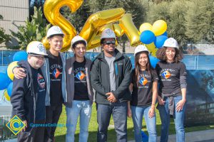 STEM² students wearing hard hats.