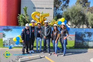 STEM² students wearing hard hats.