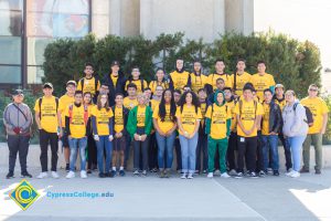 Group of Science, Engineering and Math students wearing yellow shirts.