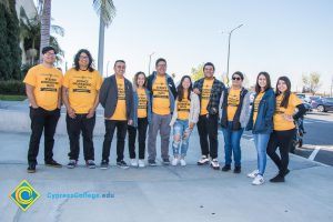 Group of Science, Engineering and Math students wearing yellow shirts.