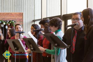 Cypress College singing at the 2018 EOPS Holiday Celebration.