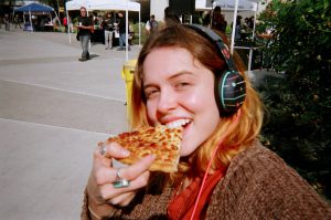 Girl eating pizza