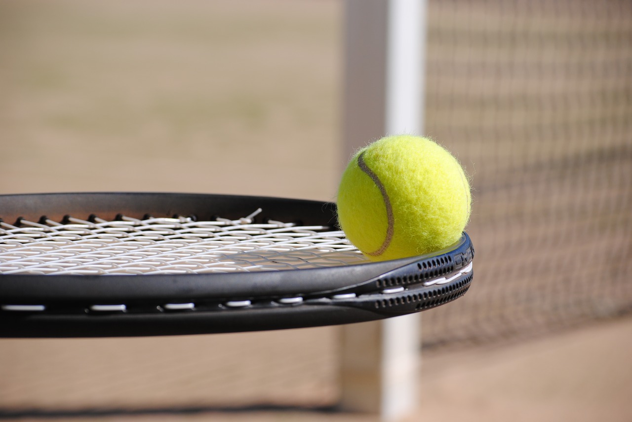 Tennis ball on a racket