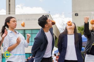 Students participating in a donut-eating contest