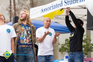 Students participating in a donut-eating contest