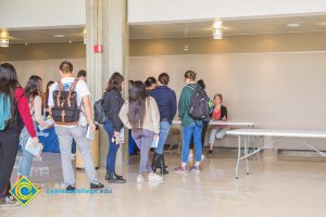 Students waiting in line to have Ellen Forney sign her book.