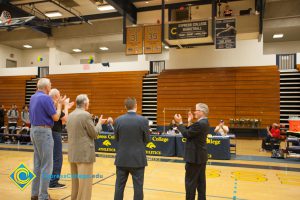 Swen Nater, Mark Eaton, Don Johnson, Rick Rams and Bob Simpson applauding.