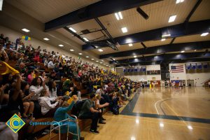 Fans cheering in the stands at the Legends of Hoops night.