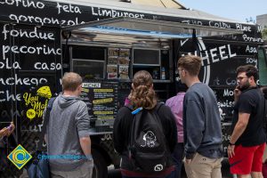 Students get food from a food truck.