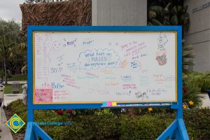 A whiteboard shares student ideas at a stress-relieving event.