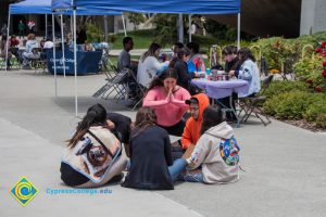 Students meditate at a stress-relieving event.