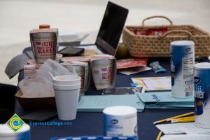 Snacks are stacked on a table at a stress-relieving event.