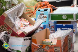 Snacks are stacked on a table at a stress-relieving event.