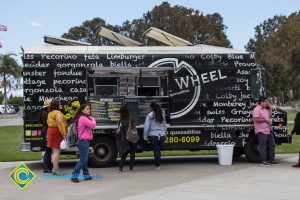 Students get food from a food truck.