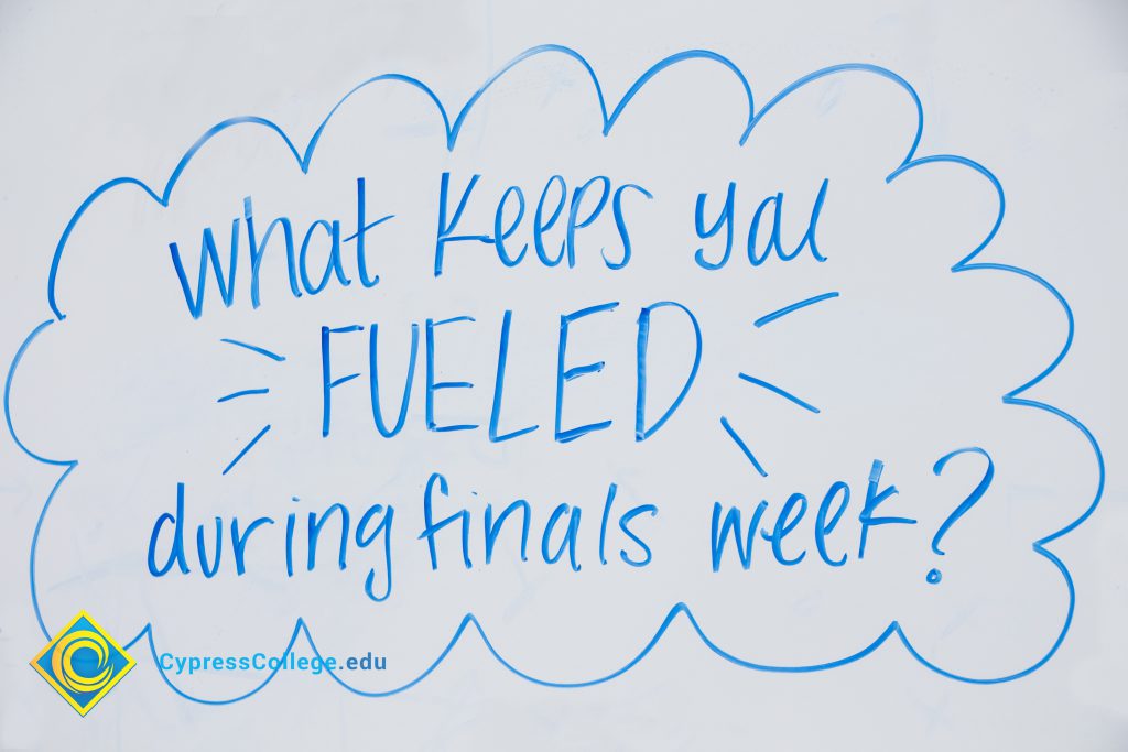 A whiteboard shares student ideas at a stress-relieving event.