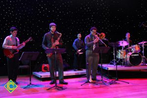 Group of musicians playing at the 39th Annual Americana Awards.