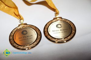 Two President's Distinguished Service Award medals .