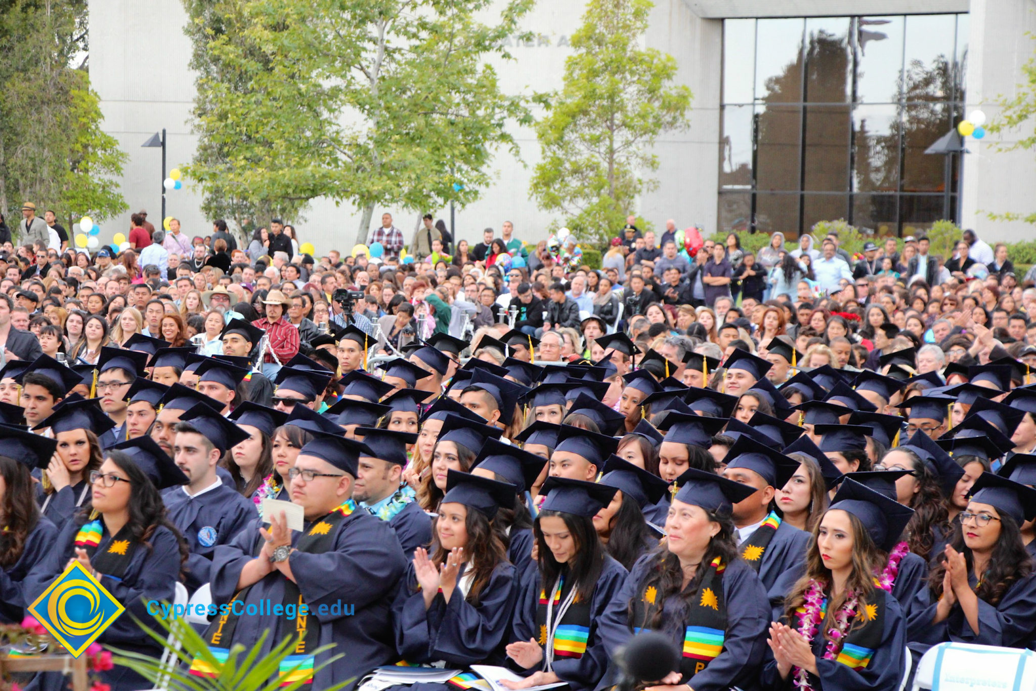 Graduates in their cap and gown at commencement.