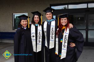 EOPS staff wearing graduation regalia during the 48th Commencement.