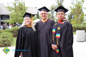 Staff in graduation regalia during the 48th Commencement.