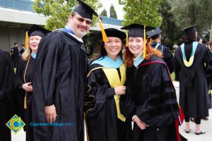 Staff in graduation regalia during the 48th Commencement.