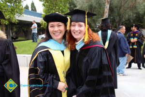 Staff in graduation regalia during the 48th Commencement.