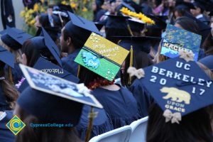 Graduates in their cap and gown at commencement.