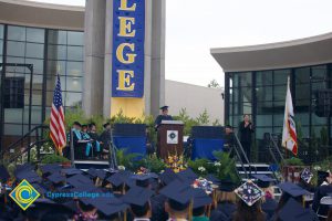 Stage with dignitaries and speaker during the 48th Commencement.