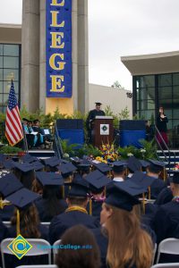 Stage with dignitaries and speaker during the 48th Commencement.