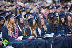 Graduates in their cap and gown at commencement.