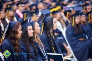 Graduates in their cap and gown at commencement.