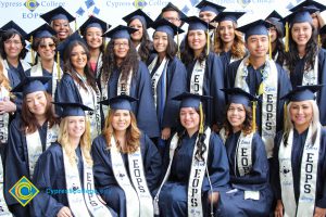 A large group of EOPS students in their cap and gown.