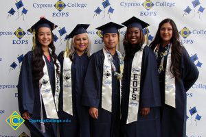 EOPS students in their cap and gown.