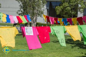 T-shirts hanging on a line for Sexual Assault Awareness Month.