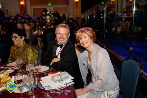 President JoAnna Schilling, her husband Steve, and Carmen Dominguez.