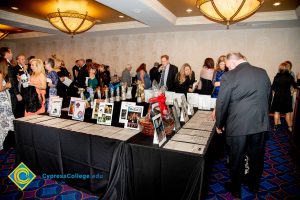 Guests looking at Silent Auction items.