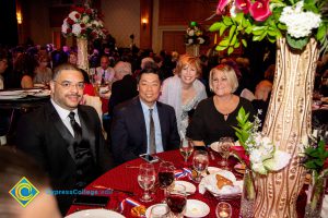 President, JoAnna Schilling with seated guests at the 44th Annual Americana Awards.