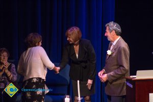 Dr. JoAnna Schilling greets visitors at Yom HaShoah event