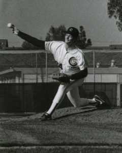 Cypress College baseball player pitching a ball.
