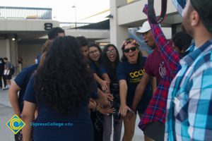 Students in a circle doing a huddle break