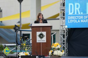 Woman speaking at podium