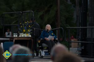 Holocaust Survivor Gerda Seifer in wheelchair giving speech at Yom HaShoah