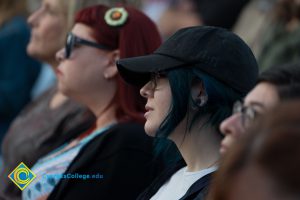 Women in audience at Yom HaShoah