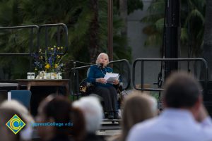 Holocaust Survivor Gerda Seifer in wheelchair giving speech at Yom HaShoah