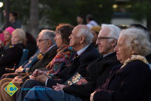 Holocaust survivors sitting together at Yom HaShoah